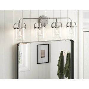 Vanity lights. Two with 3 lights. Two with 4 lights. $75 each. Chrome finish